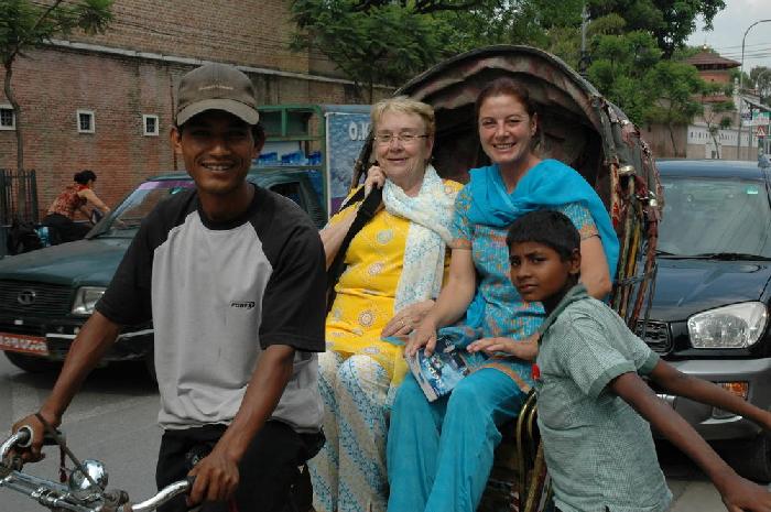 Maman dans un rickshaw